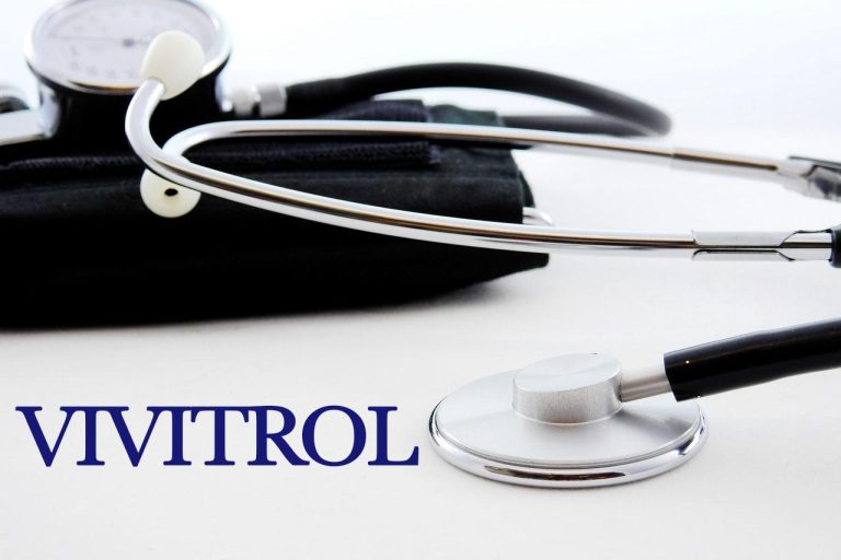 stethoscope on desk with vivitrol text