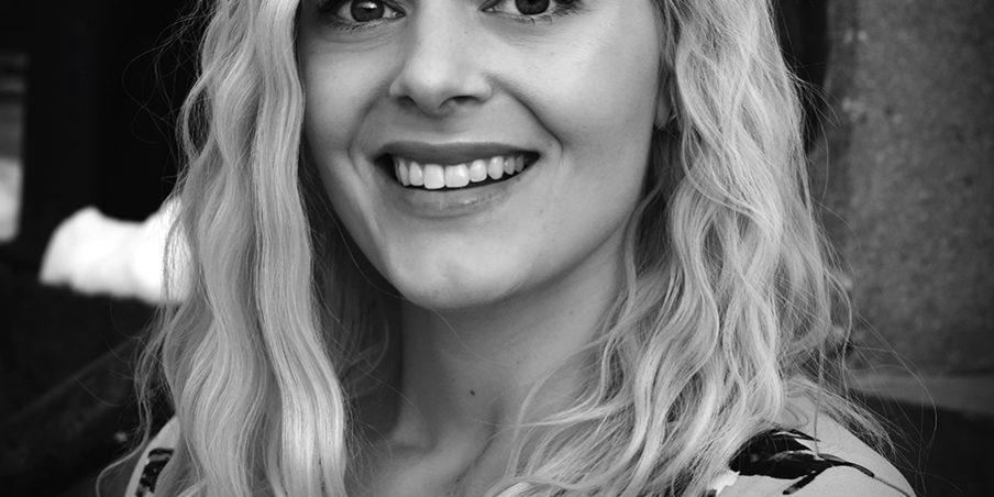 girl with crimped hair smiling