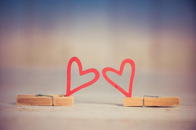 projectoflovingyourself two paper hearts on clothespins