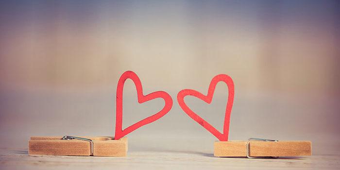 projectoflovingyourself two paper hearts on clothespins