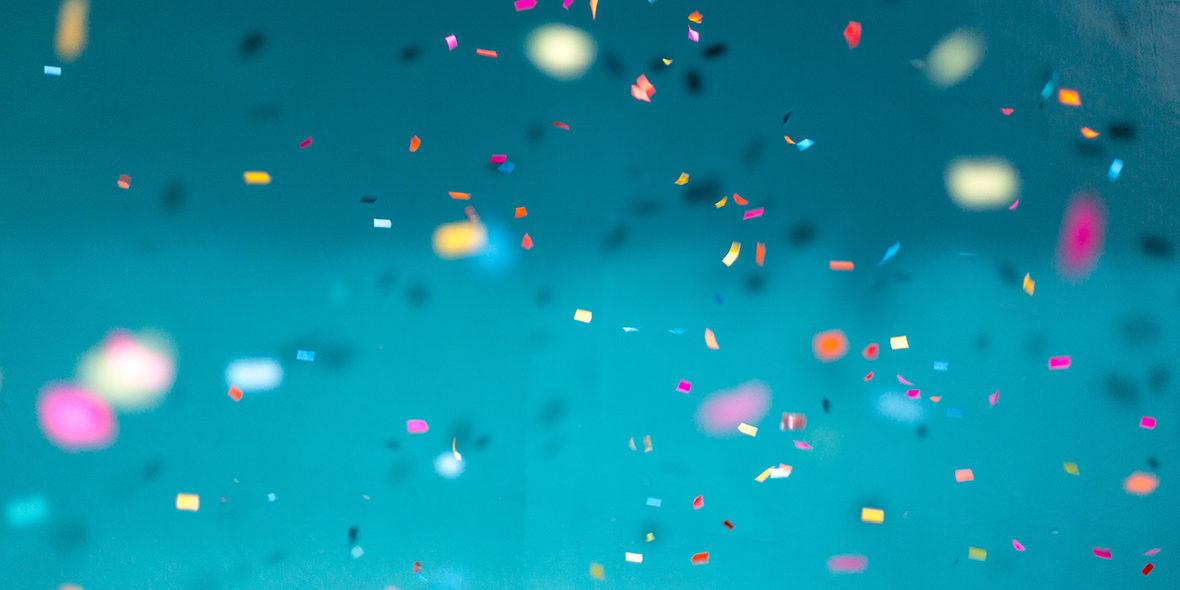 confetti with a blue background