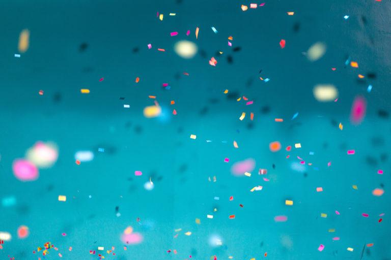 confetti with a blue background