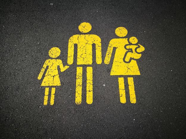 familydisease yellow concrete road sign of family