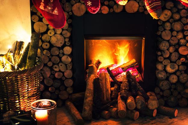 fireplace with wood around it