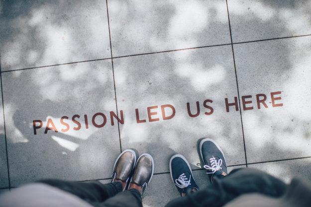 passion led us here two feet on sidewalk